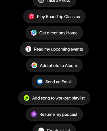 Screen with Siri AI requests, including Play Road Trip Classics, Get directions Home, Read my upcoming events, Add photo to Album, Send an Email, Add song to workout playlist, Resume my podcast.